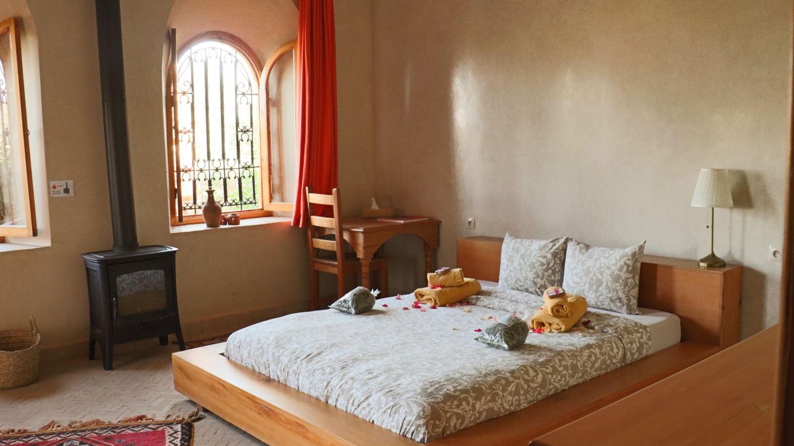 Cozy bedroom with traditional Moroccan decor at Bab Zouina retreat