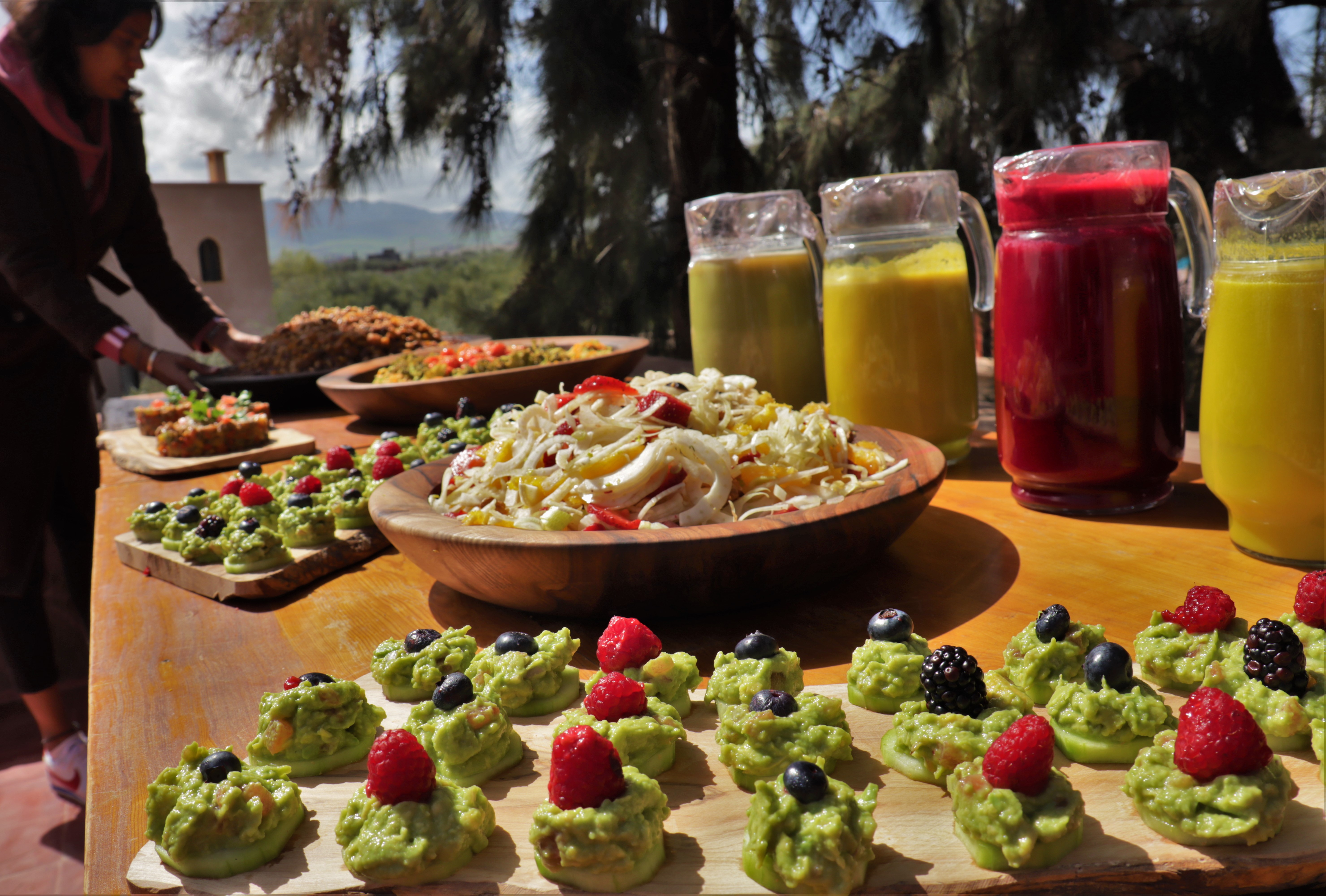 Vibrant healthy meal spread with fresh juices and colorful dishes at Bab Zouina